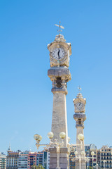 Fototapeta na wymiar clock tower on the beach of the shell, san sebastian, spain