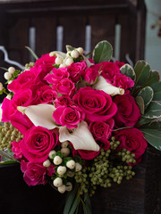 Wedding bouquet of Yak crimson roses. Copy space.