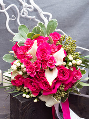 Wedding bouquet of Yak crimson roses. Copy space.