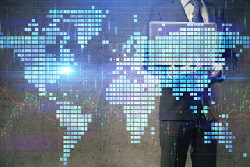 Double exposure of businessman working on laptop on background. International business hologram in front. Concept of success.