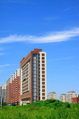 Fototapeta premium Building under the blue sky white clouds