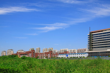 Building under the blue sky white clouds
