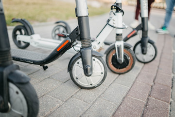 Electric scooter rental in the city. The problem of traffic jams, environmental transport in the city.