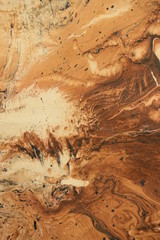 Texture of blurred sand coffee color