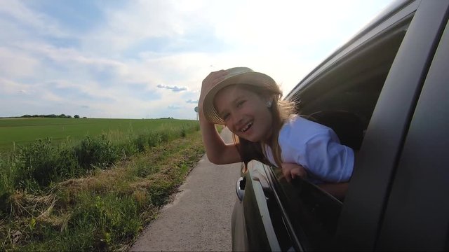 Little girl on road trip full of wonder and exploration. Lifestyle, family travel concept.