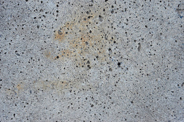 Texture of porous concrete with craters.