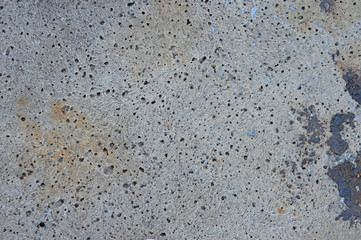 Texture of porous concrete with craters.