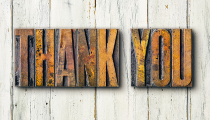 Antique letterpress wood type printing blocks on a white backgound - Thank you