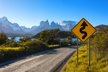 Road in Torres del Paine National park, Chile, Patagonia – part of National System of Protected Forested Areas of Chile, one of largest parks in the country and declared a Biosphere reserve by UNESCO