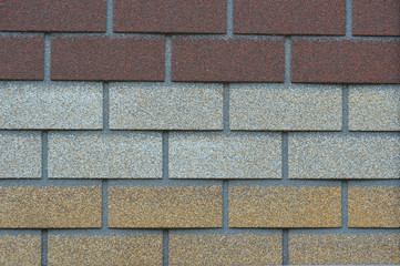 Texture of multicolored brick stripes
