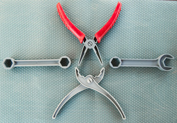 toy instruments tools on a neutral background