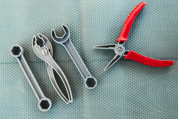 toy instruments tools on a neutral background