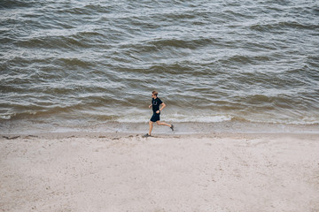running man on the beach