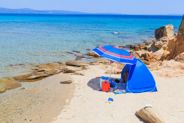 Fototapeta na wymiar Summer travel camping on lonely sand beach