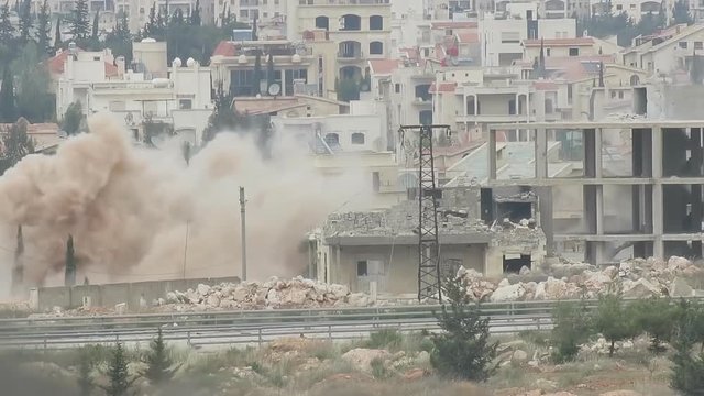 shelling of houses in the city of Aleppo (Syria)