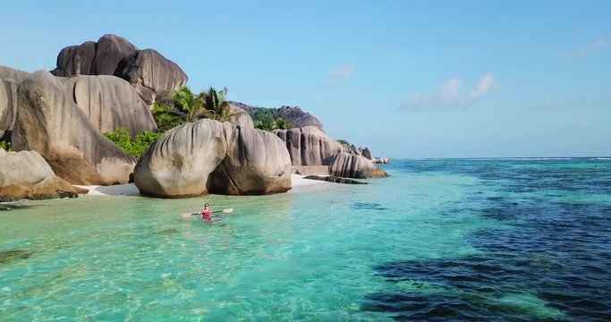 Aerial Backward: Unique Rock formation in the Middle of Beach of Seychelles