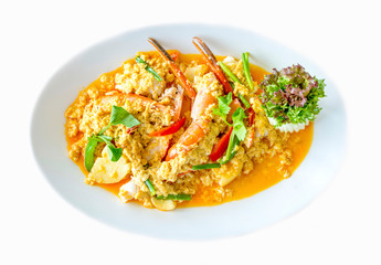 Stir fried shrimp or prawn in curry powder the famous delicious Thai food on white background