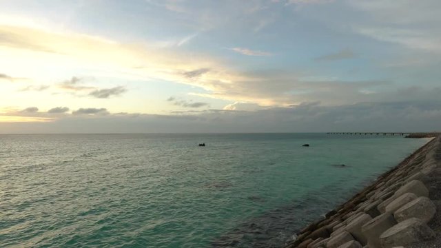 Shimoji island, Japan-June 27, 2019: (15x times) Sunset at the north of Miyako Shimojishima airport 