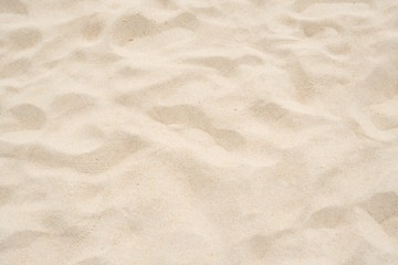 Obraz na płótnie Canvas Cream color of sand texture background.