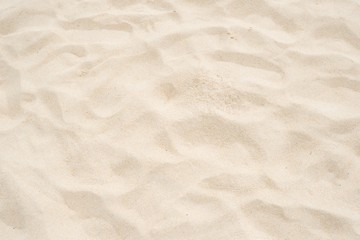 Fototapeta na wymiar Cream color of sand texture background.