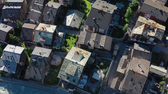 Aerial view of Zermatt, town under famous mountain Matterhorn, turn of spring and summer - landscapes of Swiss Alps from above, Switzerland, Europe