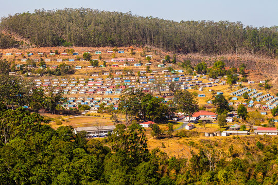 Panoramic view of typical village with colorful houses arranged in geometric manner, Swaziland, South Africa