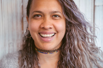 Cheerful lesbian woman smiling.