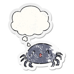 cartoon spider and thought bubble as a distressed worn sticker