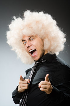 Young Man Wearing Afro Wig