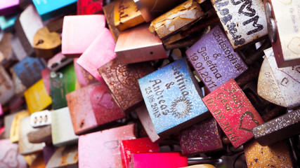 close up view on love locks at the Hohenzollern Bridge in Cologne