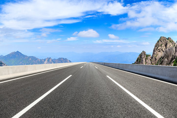 Asphalt highway and beautiful mountain nature landscape in Huangshan,Anhui,China.