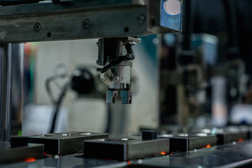 automation machine and detail close up in machine automatic with robotic automation technology for technology production factory