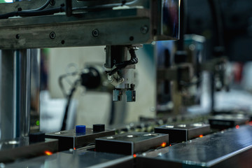 automation machine and detail close up in machine automatic with robotic automation technology for technology production factory