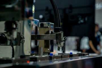 automation machine and detail close up in machine automatic with robotic automation technology for technology production factory