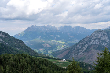 Fototapeta na wymiar Alpe Lusia, Dolomites, Alps, Italy. Beautiful Mountain View. Summer mountain landscape in val di Fassa, Italian dolomites.