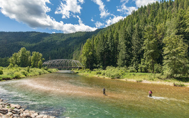 Fly fishing on the Coeur d'Alene river in Idaho mountains