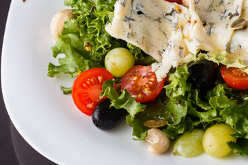 Salad provence. Mix lettuce tomato grape olive and blue cheese