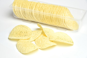 Potato chips on white background. Junk Food and snack.