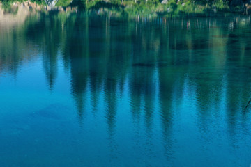 Lake Caress Dolomites Italy. Lake of Caresse in Italy. Scenic place and famous touristic destination. Primeval nature