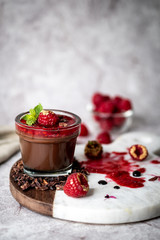 Dark Chocolate Mousse Pudding with Raspberries.