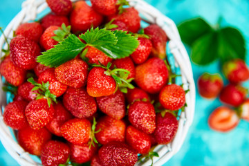 Strawberries in white basket. Fresh strawberries. Beautiful strawberries.