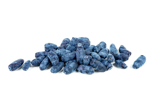 Fresh honeysuckle berries isolated on white background