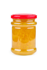 Glass jars with peach jam on white background