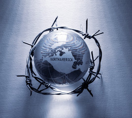 Globe wrapped in barb wire