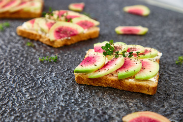 Healthy breakfast toasts from sliced watermelon radish