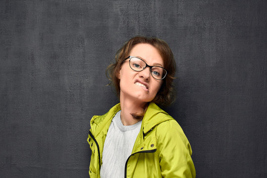 Portrait of comical woman grimacing and imitating sexy lady