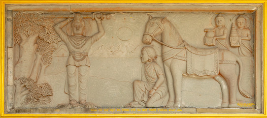 Carved Picture on the temple wall in Danang