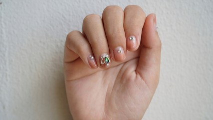 hand with manicure on white background