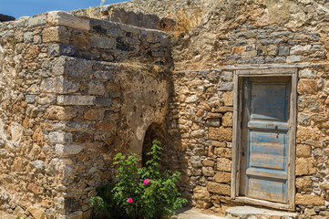 Fototapeta na wymiar Spinalonga island architecture in Elounda bay of Crete island in Greece