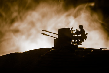 War Concept. Military silhouettes fighting scene on war fog sky background,